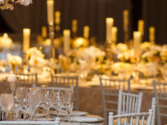 A table with a bunch of glasses on it
